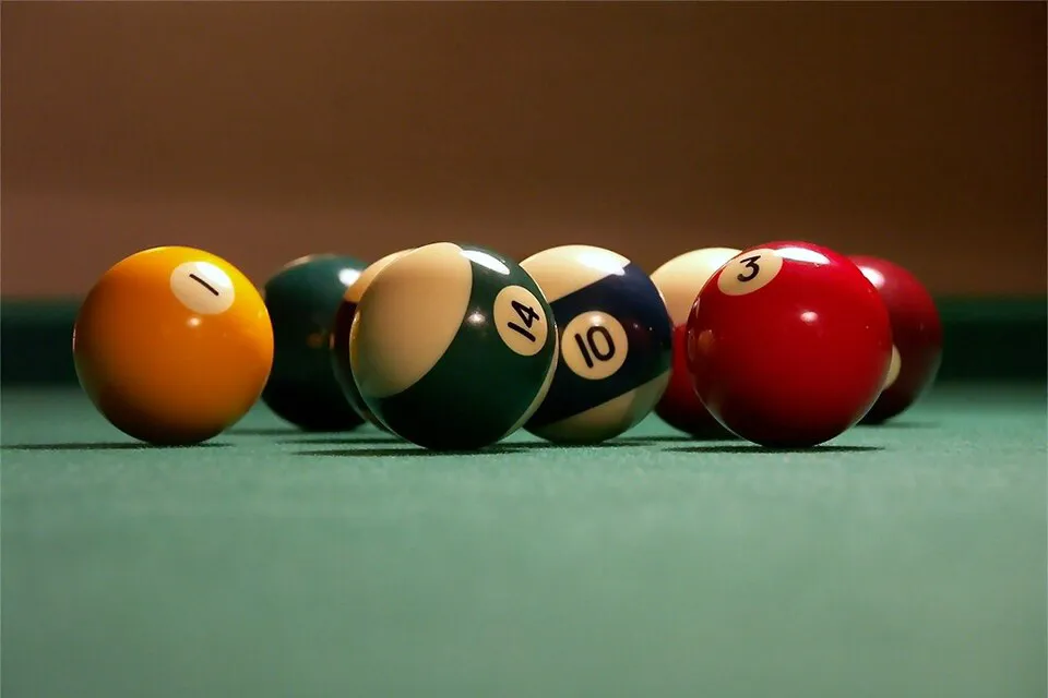 closeup photo of some billiard balls on a table